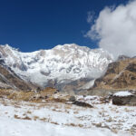 annapurna base camp and annapurna massif in background