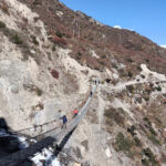 crossing suspension bridge in Round Annapurna